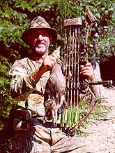 photo of hunter with grouse