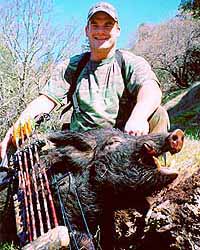 Mike Wall with a 200+ pound Wild Boar